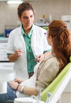 Dental patient smiling at dentist