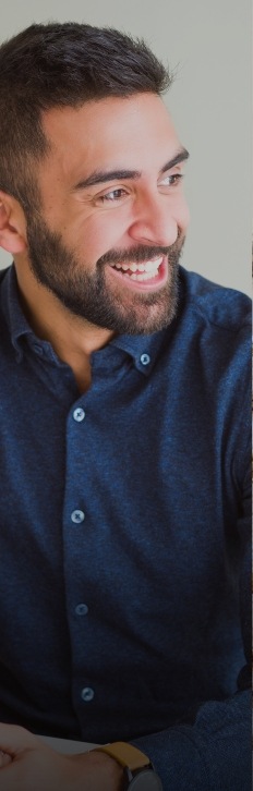 Man sharing smile after replacing missing teeth