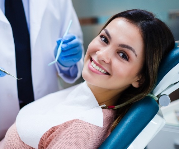 Woman smiling during dental checkup