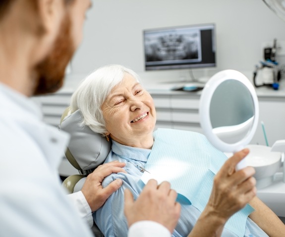 Woman with healthy smile after fluoride treatment