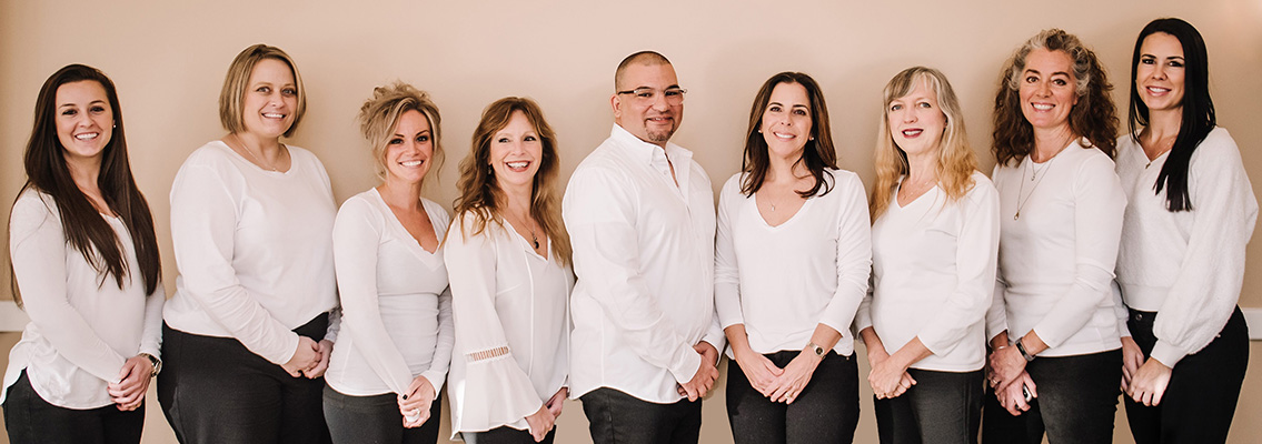 Nine members of the Amherst Dental Group team