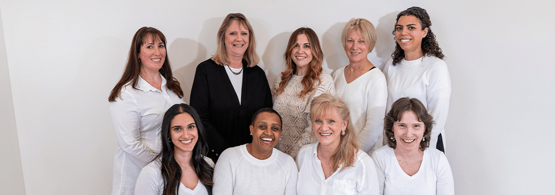 Seven members of the Amherst Dental Group team